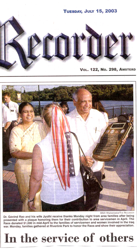 Servicemen honoring Dr&Mrs Rao 071403-01