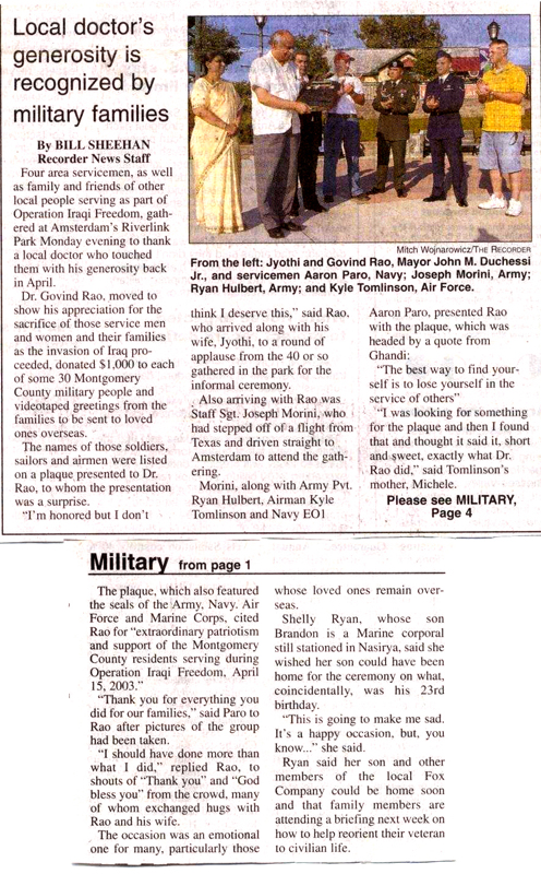 Servicemen honoring Dr&Mrs Rao 071403-02